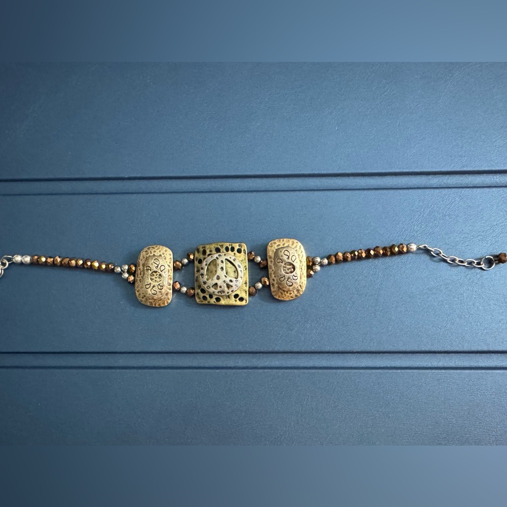 Elegant Gold and Bronze Peace Bracelet